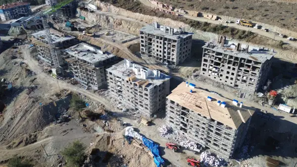 Osmaniye İli Bahçe İlçesi Çamlıca Mahallesi 2.Etap 417 Adet Konut, Aslanlı Mahallesi 2.Etap 143 Adet Konut ve 4 Adet Dükkan ile İslam Mahallesi 1 Adet Cami İnşaatları ile Altyapı ve Çevre Düzenlemesi İşi.