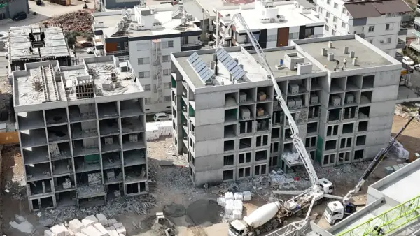 Hatay İli İskenderun İlçesi Aşkarbeyli Mahallesi Merkez 3. Bölge 386 Adet Konut (+4 kd.) 6 Adet Dükkan ve 2 Adet Depo İnşaatları İle Altyapı ve Çevre Düzenlemesi İşi